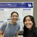 Lab members in front of research poster at annual CCTS conference