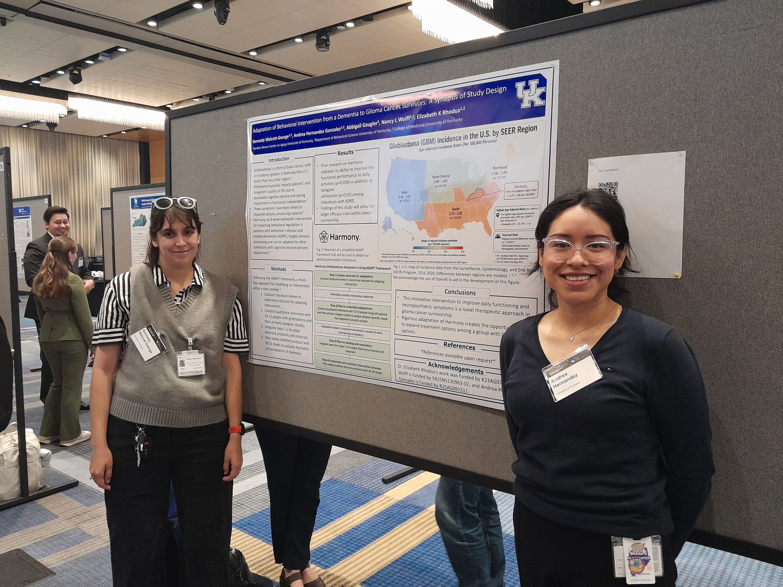 Kennedy and Andrea pose in front of poster at Markey Cancer Research Day